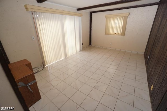 293 Oak Ridge Rd, Clark Twp, NJ 07066 - unfurnished room with light tile patterned floors and plenty of natural light