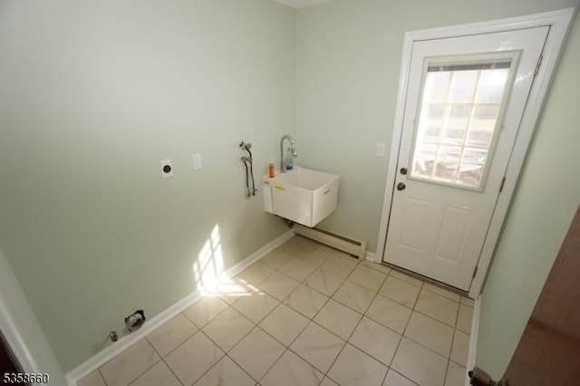 293 Oak Ridge Rd, Clark Twp, NJ 07066 - laundry room featuring electric dryer hookup, hookup for a washing machine, a baseboard heating unit, light tile patterned floors, and baseboards
