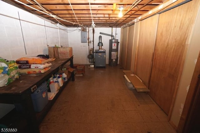 293 Oak Ridge Rd, Clark Twp, NJ 07066 - unfinished below grade area with gas water heater, electric panel, tile patterned floors, and a heating unit