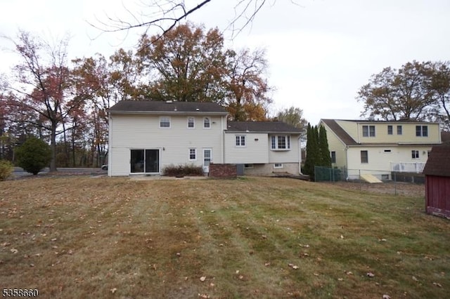 293 Oak Ridge Rd, Clark Twp, NJ 07066 - rear view of house with a yard