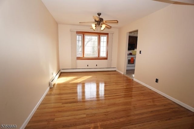 293 Oak Ridge Rd, Clark Twp, NJ 07066 - unfurnished room with a baseboard radiator, ceiling fan, wood finished floors, and baseboards