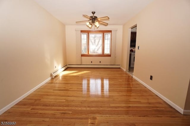 293 Oak Ridge Rd, Clark Twp, NJ 07066 - unfurnished room with light wood-type flooring, ceiling fan, baseboards, and a baseboard radiator