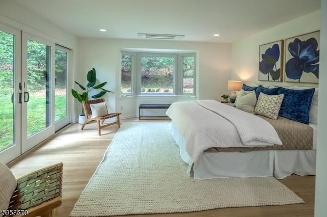 25 Highland Ave, Peapack Gladstone Boro, NJ 07931 - bedroom featuring light wood-style flooring, access to exterior, french doors, and recessed lighting