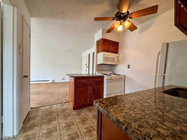 kitchen with white appliances, a baseboard radiator, a ceiling fan, carpet flooring, and a textured ceiling