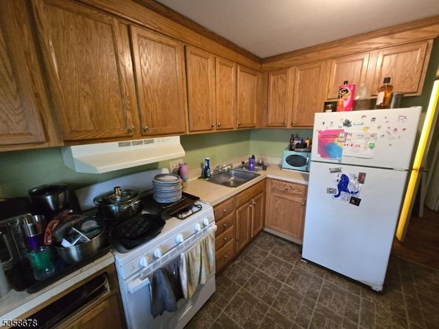 7 Columbia Dr Unit 7, Bridgewater Twp, NJ 08807 - kitchen with white appliances, under cabinet range hood, light countertops, a sink, and brown cabinetry