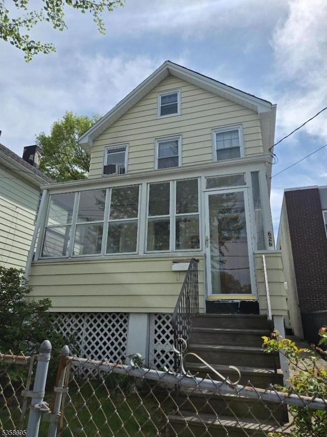 626 Tremont Ave, City Of Orange Twp, NJ 07050 - back of property with a sunroom and entry steps