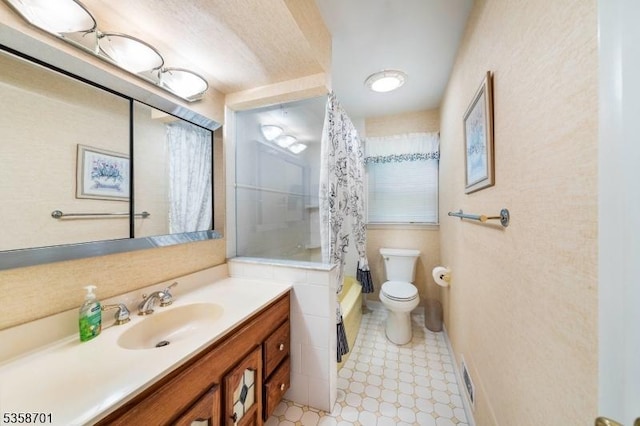 72 Brookside Dr, New Providence Boro, NJ 07974 - full bath featuring toilet, vanity, shower / bath combo with shower curtain, and tile patterned floors