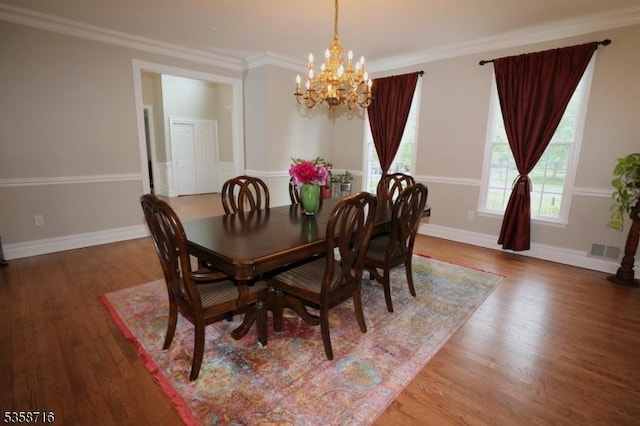 236 Berkley Ave, Montgomery Twp, NJ 08502 - dining space featuring a chandelier, wood finished floors, ornamental molding, and baseboards