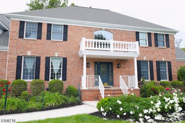 236 Berkley Ave, Montgomery Twp, NJ 08502 - georgian-style home featuring a balcony and brick siding