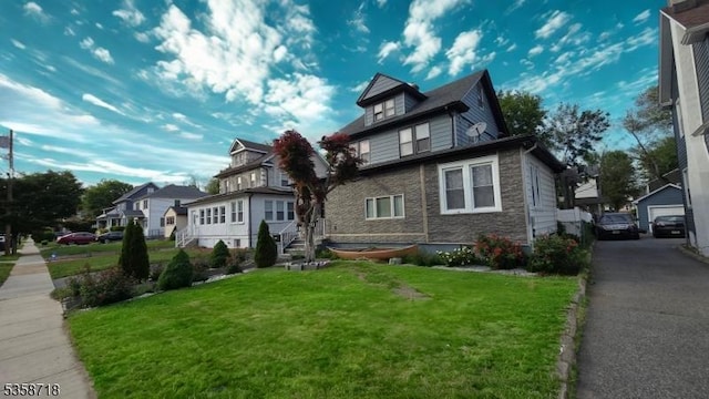 131-133 Sumner Ave, Plainfield City, NJ 07062 - traditional style home featuring a front yard and a residential view