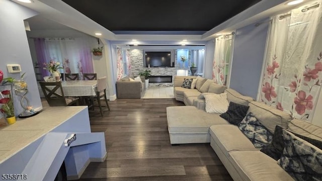 131-133 Sumner Ave, Plainfield City, NJ 07062 - living area with wood finished floors, a fireplace, recessed lighting, and a raised ceiling