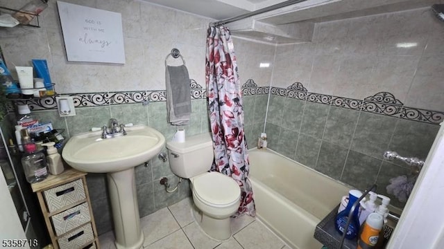 131-133 Sumner Ave, Plainfield City, NJ 07062 - full bathroom with tile walls, toilet, tile patterned flooring, shower / bath combination with curtain, and a sink