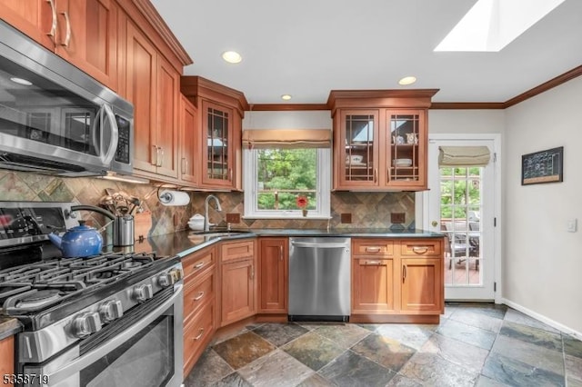 4-A Southview Rd, Randolph Twp, NJ 07869 - kitchen with appliances with stainless steel finishes, a sink, crown molding, a skylight, and decorative backsplash