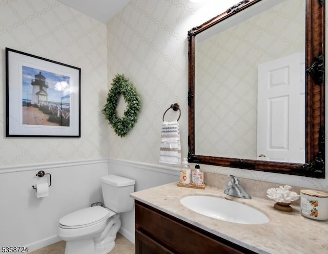 9 Blue Bird Ct, Randolph Twp, NJ 07869 - bathroom with vanity, toilet, wallpapered walls, baseboards, and tile patterned floors