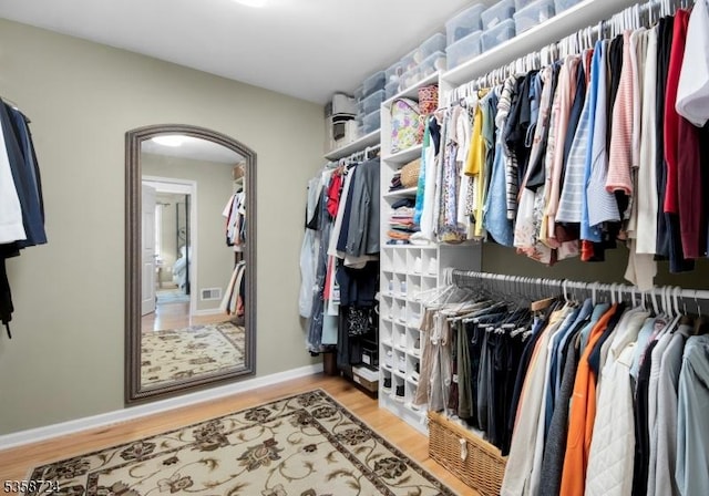 9 Blue Bird Ct, Randolph Twp, NJ 07869 - walk in closet featuring wood finished floors