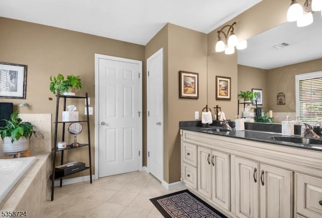 9 Blue Bird Ct, Randolph Twp, NJ 07869 - bathroom featuring vanity, tile patterned flooring, tiled tub, and baseboards
