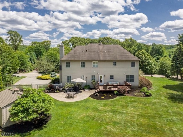 9 Blue Bird Ct, Randolph Twp, NJ 07869 - back of house with a wooden deck, a chimney, and a patio