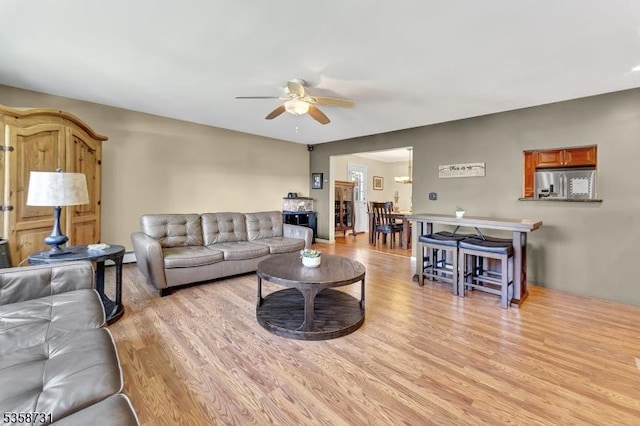 206 Thomas St, Cranford Twp, NJ 07016 - living room featuring ceiling fan and light wood-style flooring