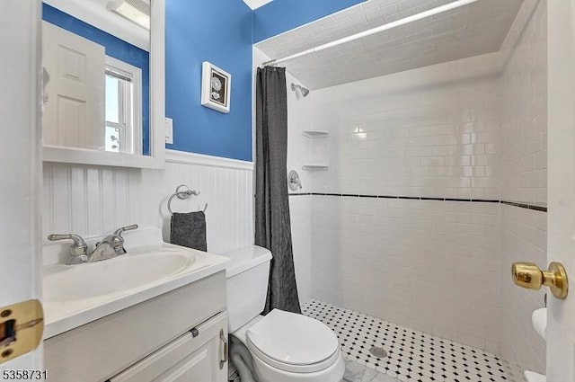 206 Thomas St, Cranford Twp, NJ 07016 - bathroom featuring toilet, tiled shower, vanity, and wainscoting