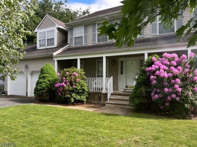 143 Crenshaw Dr, Mount Olive Twp, NJ 07836 - view of front of property featuring a porch, a front yard, and driveway