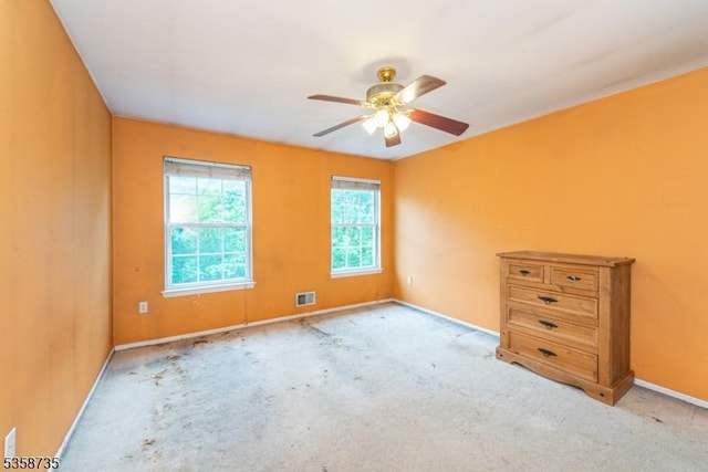 143 Crenshaw Dr, Mount Olive Twp, NJ 07836 - spare room with ceiling fan, baseboards, and light colored carpet