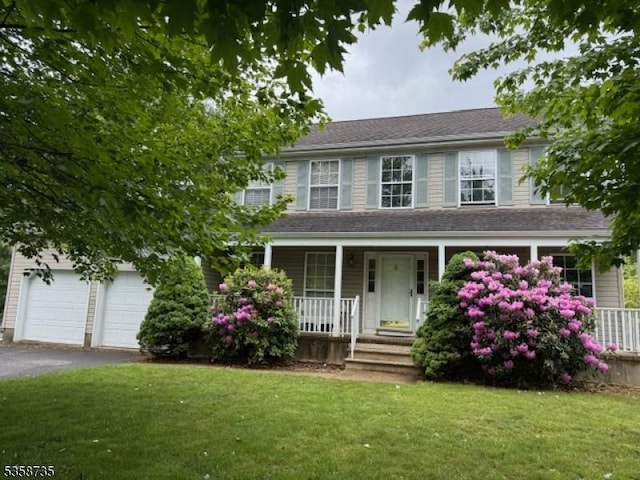143 Crenshaw Dr, Mount Olive Twp, NJ 07836 - colonial inspired home featuring covered porch, a front lawn, asphalt driveway, and a garage