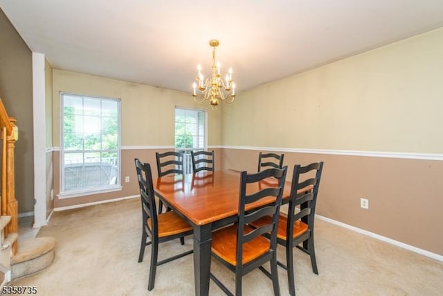 143 Crenshaw Dr, Mount Olive Twp, NJ 07836 - dining room with a chandelier, baseboards, and light colored carpet