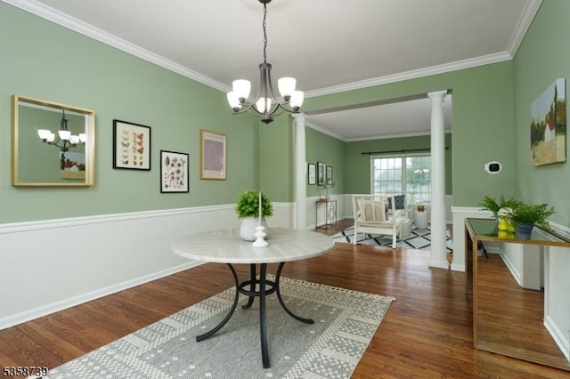 3 Firestone Ct, Montgomery Twp, NJ 08558 - dining area with a chandelier, ornate columns, ornamental molding, and wood finished floors