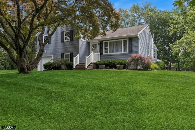 457 Valley Rd, Long Hill Twp, NJ 07933 - tri-level home featuring a front lawn and an attached garage