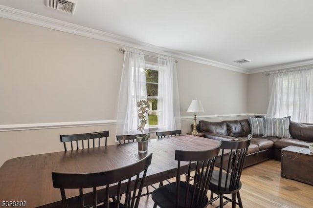 457 Valley Rd, Long Hill Twp, NJ 07933 - dining space with crown molding and wood finished floors