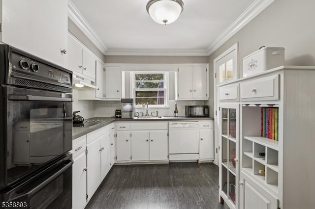 457 Valley Rd, Long Hill Twp, NJ 07933 - kitchen with black appliances, under cabinet range hood, white cabinets, crown molding, and backsplash