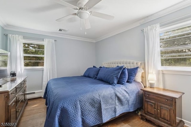 457 Valley Rd, Long Hill Twp, NJ 07933 - bedroom featuring a baseboard radiator, wood finished floors, crown molding, and ceiling fan