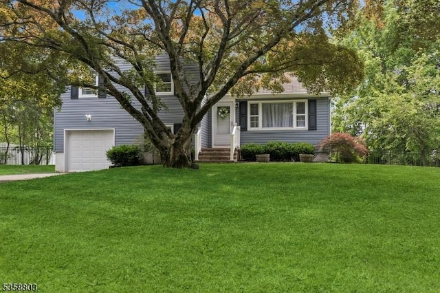 457 Valley Rd, Long Hill Twp, NJ 07933 - view of front of home with an attached garage, a front lawn, and driveway