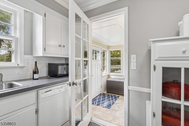 457 Valley Rd, Long Hill Twp, NJ 07933 - kitchen featuring dishwasher, black microwave, tasteful backsplash, healthy amount of natural light, and ornamental molding