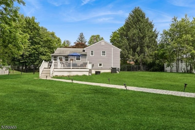 457 Valley Rd, Long Hill Twp, NJ 07933 - back of property featuring a wooden deck and a chimney