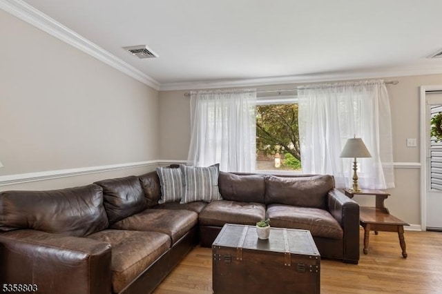 457 Valley Rd, Long Hill Twp, NJ 07933 - living area with crown molding, plenty of natural light, and light wood-type flooring