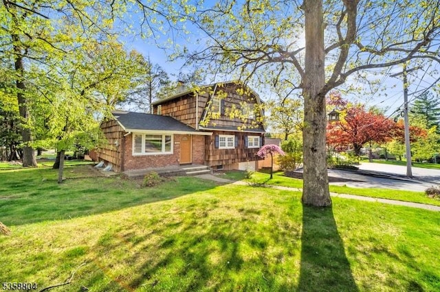 132 Hiawatha Blvd, Oakland Boro, NJ 07436 - view of front of home featuring brick siding and a front yard