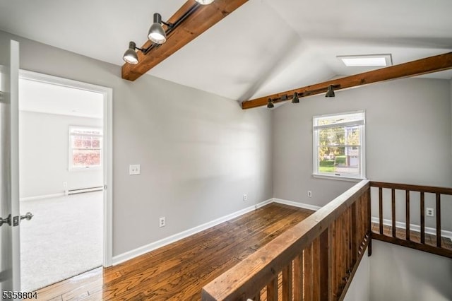 132 Hiawatha Blvd, Oakland Boro, NJ 07436 - spare room featuring lofted ceiling, wood finished floors, and baseboards