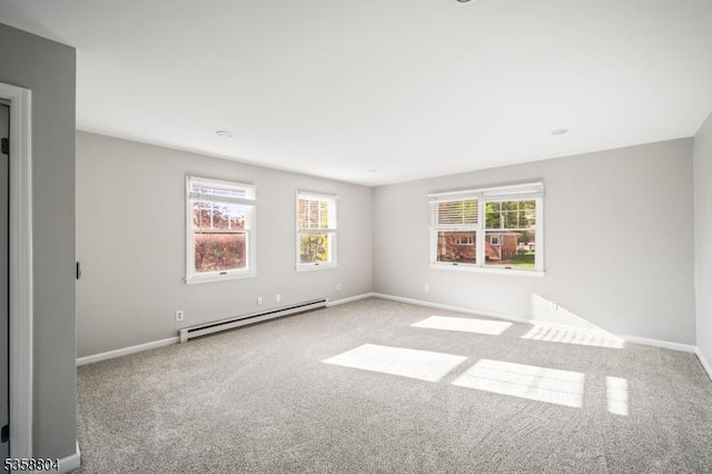 132 Hiawatha Blvd, Oakland Boro, NJ 07436 - carpeted spare room featuring a baseboard heating unit and baseboards
