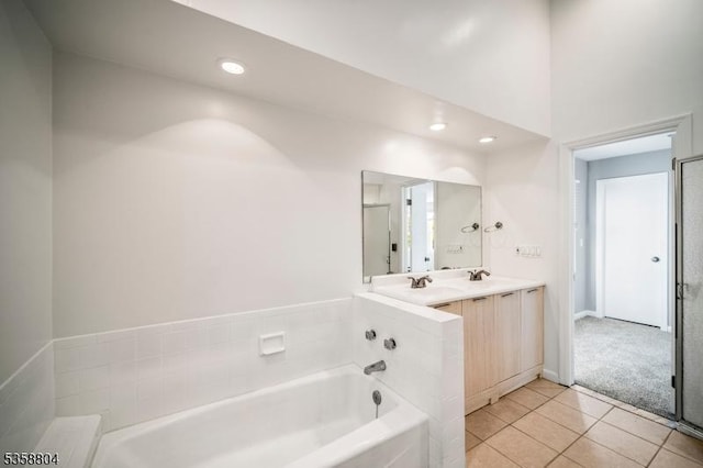 132 Hiawatha Blvd, Oakland Boro, NJ 07436 - full bath with a garden tub, tile patterned flooring, recessed lighting, and double vanity