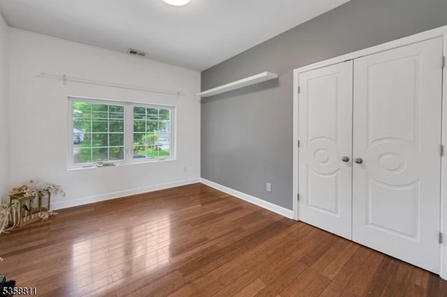 21-23 Sheridan Ave, West Orange Twp, NJ 07052 - unfurnished bedroom featuring wood finished floors and baseboards