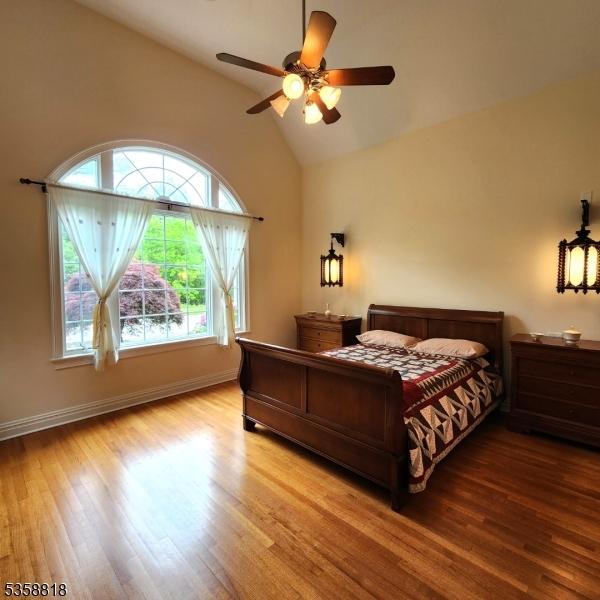 15 Hemlock Ave, Frankford Twp, NJ 07826 - bedroom with vaulted ceiling, wood finished floors, baseboards, and a ceiling fan