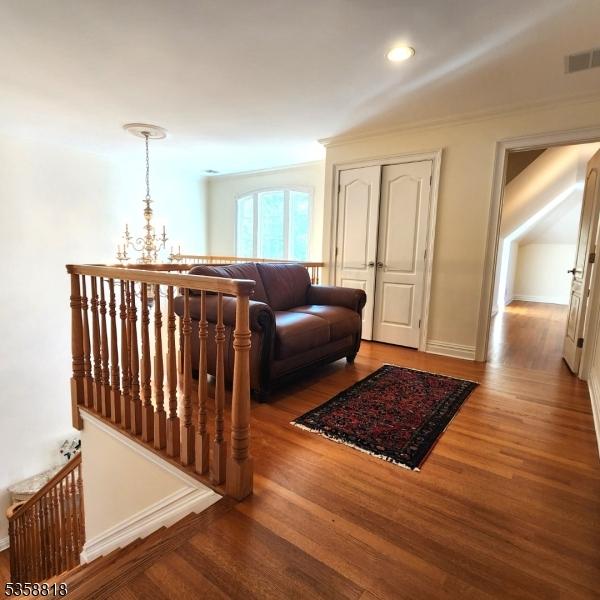 15 Hemlock Ave, Frankford Twp, NJ 07826 - hall with an upstairs landing, wood finished floors, a chandelier, and recessed lighting