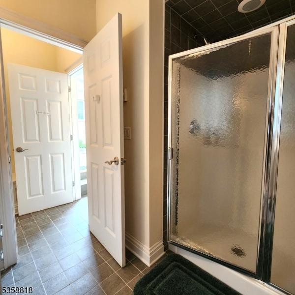15 Hemlock Ave, Frankford Twp, NJ 07826 - full bath featuring a stall shower, tile patterned floors, and baseboards