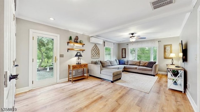 6 County Road 579, East Amwell Twp, NJ 08551 - living room with an AC wall unit, light wood-style floors, ceiling fan, crown molding, and baseboards