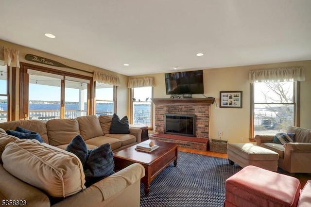 599 Point Ave, Brick Twp, NJ 08724 - living room with a brick fireplace, recessed lighting, and wood finished floors