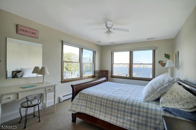 599 Point Ave, Brick Twp, NJ 08724 - bedroom with a baseboard radiator, carpet floors, baseboards, and ceiling fan