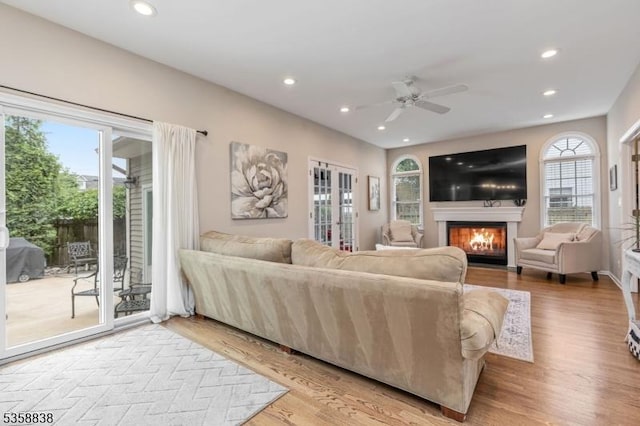 411 Arlington Ave, South Plainfield Boro, NJ 07080 - living area featuring a fireplace with flush hearth, a ceiling fan, wood finished floors, and recessed lighting