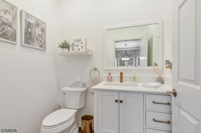 411 Arlington Ave, South Plainfield Boro, NJ 07080 - bathroom featuring toilet and vanity