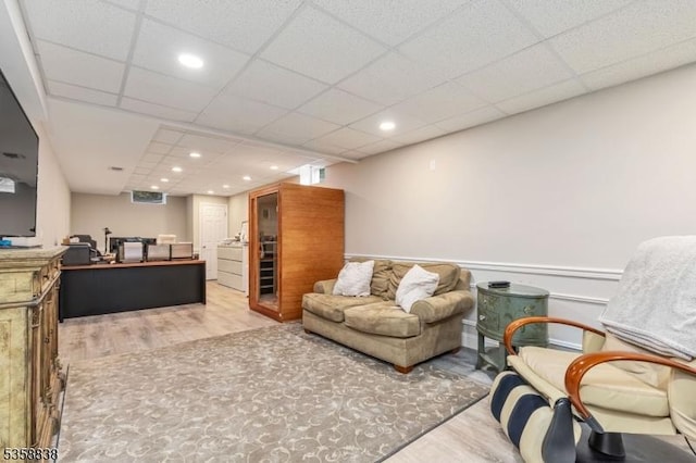 411 Arlington Ave, South Plainfield Boro, NJ 07080 - living area with wood finished floors, a drop ceiling, and recessed lighting